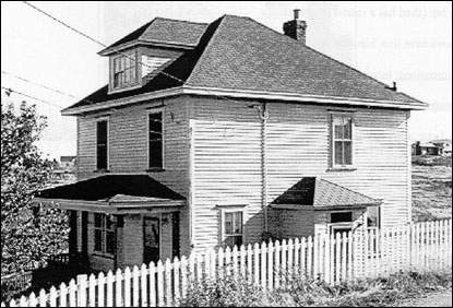 House Featuring a Hipped Gable Roof