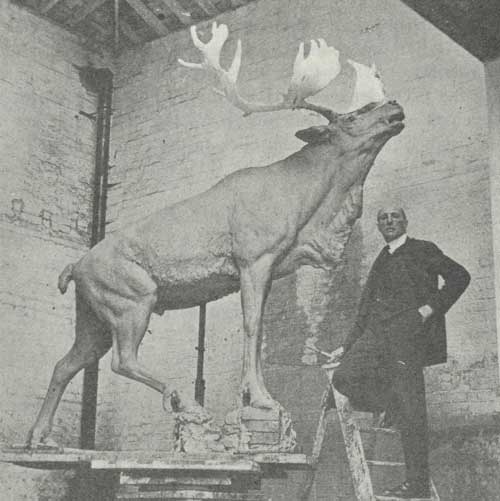 Capt. Basil Gotto with his Caribou Sculpture, ca. 1921