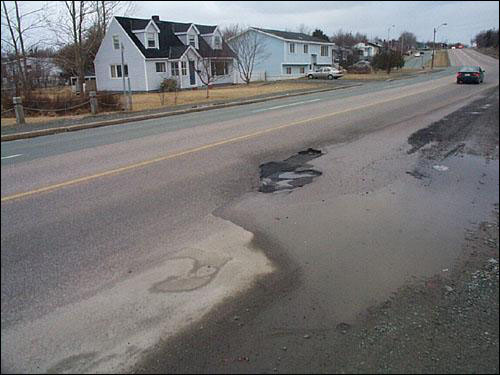 Pothole on Logy Bay Road, St. John's, NL