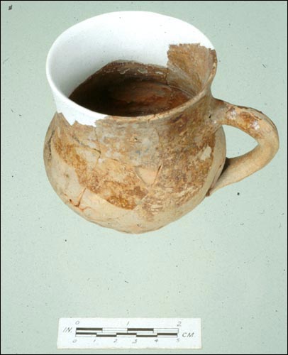 Partially restored North Devon mug