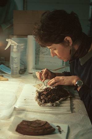 Mechanical cleaning: the first step in the conservation of an artifact.