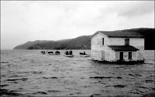 Moving a house in Trinity Bay, NL, ca. 1968