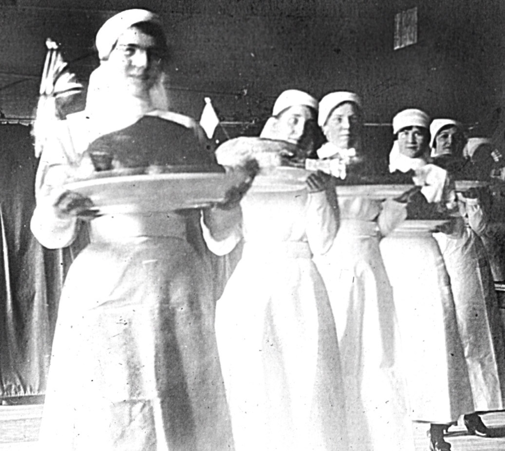 VAD Members Serving a Meal, Christmas, 1916